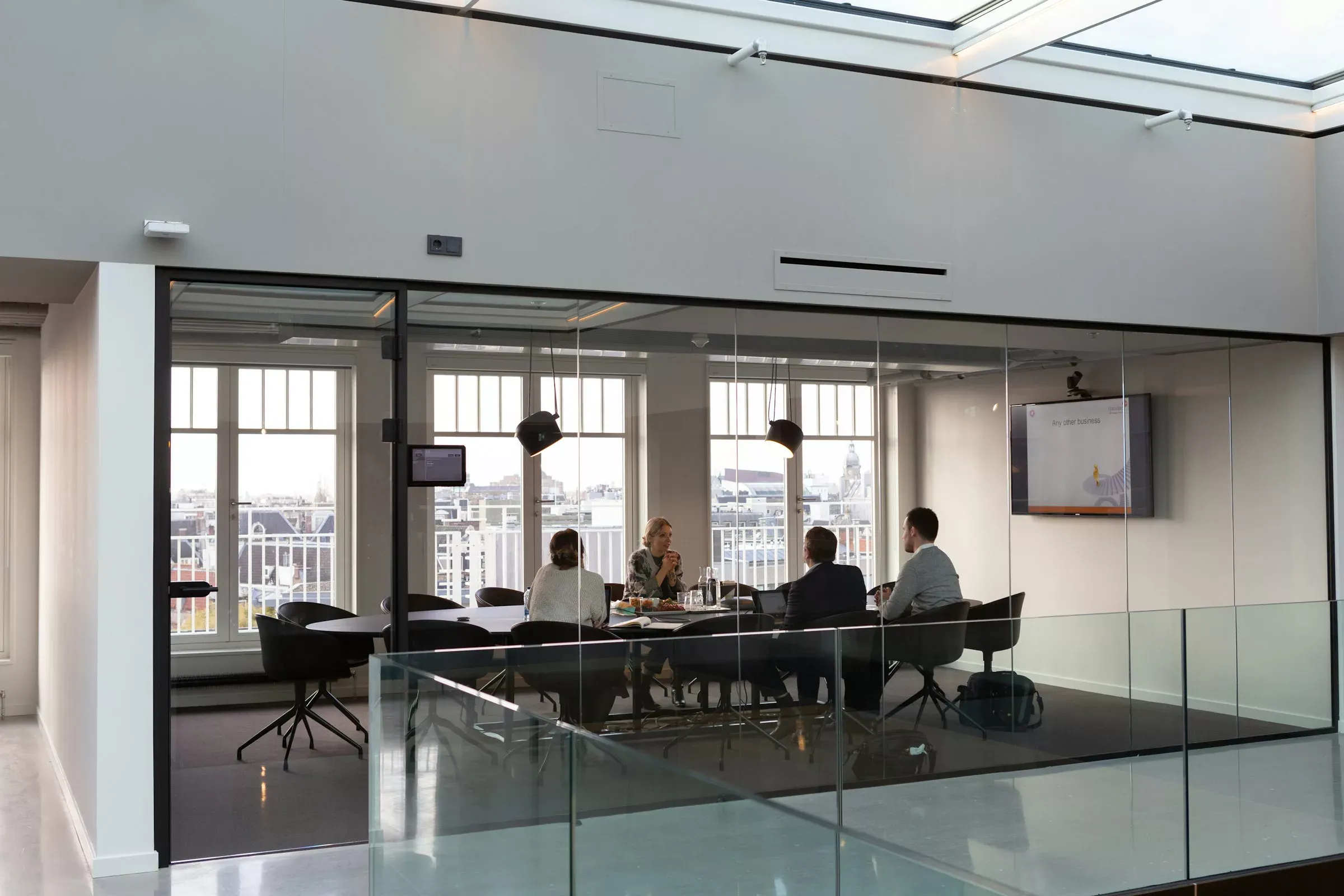 Architects discussing plans in a modern office